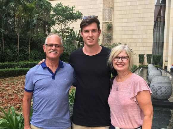 Adam Milne With His Father And Mother