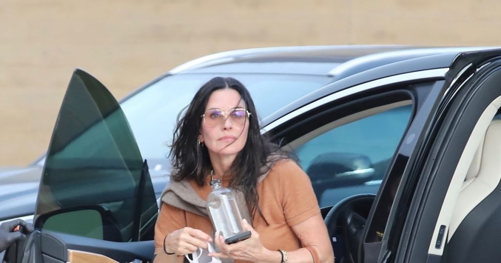 Courteney Cox With Her Car