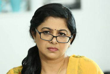 Kalyani Natarajan as Bobby's mother