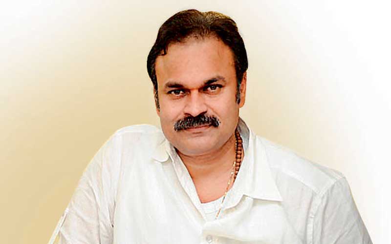 Nagendra Babu as Anandraj